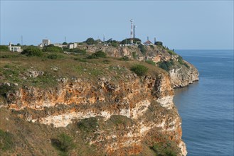 Lighthouse on the cliff edge with a view of the sea, Cape Kaliakra, Dobruja, Black Sea, Bulgaria,
