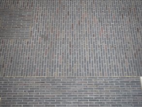 Dark brown brick wall background