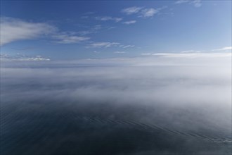 Coastal seascape in fog, Gulf of Saint Lawrence, Province of Quebec, Canada, sea, water, blue,