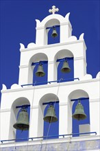 Santorini, Oia, bell tower of Panagia Platsani church on the main square, Cyclades, Greece, Europe