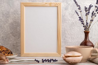 White wooden frame mockup with lavender in ceramic vase, linen textile, cup of coffee and bun on