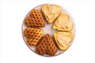 Homemade waffle with peanut butter isolated on white background. top view, flat lay, close up