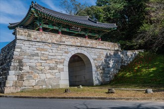 Stone front gate at entrance to Geumsansa Temple under blue sky in Gimje-si, South Korea, Asia