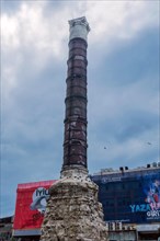 The column of Constantine with billboards in background in Istanbul, Turkiye