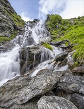 Waterfall on a mountainside, long exposure, Berliner Hoehenweg, Zillertal Alps, Tyrol, Austria,