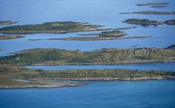 Rocky islands in the sea, Sea with archipelago islands, Ulvagsundet, Vesteralen, Norway, Europe