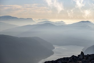Mountains and fjord Faleidfjorden, in the evening light, view from the top of Skala, Loen, Norway,