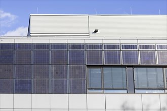 Photovoltaic modules on industrial building, Freiburg, Baden-Wuerttemberg, Germany, Europe