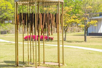 Sculpture: Wind chimes of rusted metal pipes at DMZ Peace Park. Artist unknown in Goseong, South