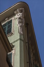 Sculpture of an altant as a roof support, Genoa, Italy, Europe
