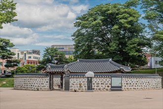 Old mud and stone jailhouse with tiled roof located in Hongjueupseong walled town in South Korea
