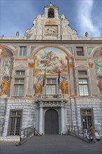 Entrance facade of the Gothic Palazzo San Giorgio with Renaissance frescoes, built in 1260, Palazzo