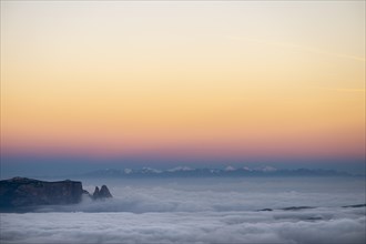 Sea of fog with Dolomite peaks in the background at blue hour, Corvara, Dolomites, Italy, Europe