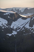 Mountain peak with Jostedalsbreen glacier in the evening light, view from the summit of Skala,