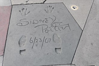 Handprints and footprints of SIDNEY POITIER, Hollywood Boulevard, Los Angeles, California, USA,