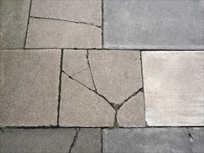 Cracked grey concrete floor background