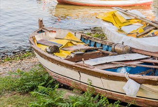 Derelict wood boat in dry dock at harbor in Istanbul, Tuerkiye