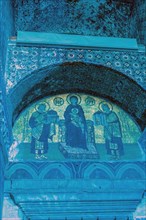 Virgin Mary holding the Christ Child inside Hagia Sophia Mosque. Noise or grain included in