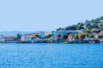 Port of Princess Island with buildings and houses around harbor in Turkey
