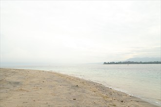 Lombok and Gili Air islands, overcast, cloudy day, sky and sea. Vacation, travel, tropics concept,