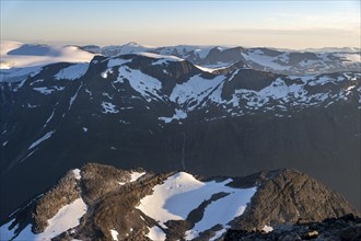 Mountain peak with Jostedalsbreen glacier in the evening light, view from the summit of Skala,