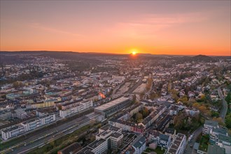 Aerial view of a city at sunset with warm sky colours, Pforzheim, Germany, Europe