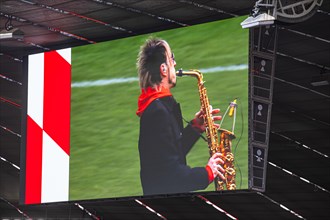 Saxophonist Noah fisherman plays at the memorial service, funeral service of FC Bayern Munich for