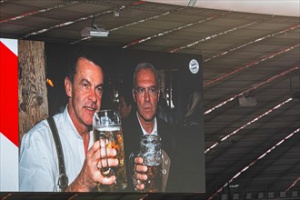 Picture of Franz Beckenbauer and Otmar Hitzfeld on the scoreboard, FC Bayern Munich funeral service