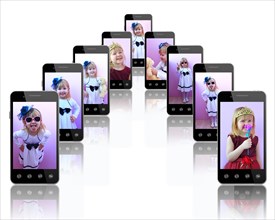 Smartphone with photo of beautiful girl. Mobile phones with images of little fashionable girl.
