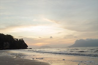 Bako national park, sea sandy beach, overcast, cloudy sunset, sky and sea, low tide. Vacation,