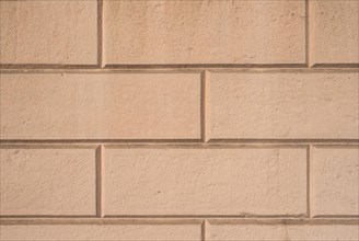 Brown ashlar wall texture background