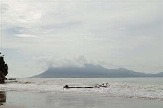 Bako national park, sea sandy beach, overcast, cloudy day, sky and sea. Vacation, travel, tropics