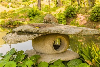 Stone carved lantern in Shukkeien gardens in Hiroshima, Japan, Asia