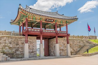Main gate of Hongjueupseong walled town under blue sky in South Korea