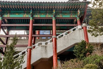 Low angle view of concrete staircase and pavilion at Buddhist temple in South Korea