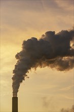 Symbolic image energy transition, fossil fuels, smoking chimney, industrial plant, chimney, flue,
