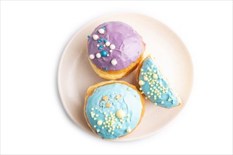 Purple and blue glazed donut isolated on white background. top view, flat lay. Breakfast, morning,