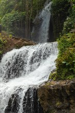 Uma Anyar waterfall, Bali island, Ubud, Indonesia. Jungle, tropical forest, daytime with cloudy sky