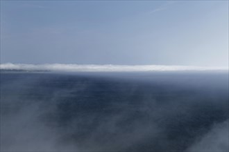 Coastal seascape in fog, Gulf of Saint Lawrence, Province of Quebec, Canada, sea, water, blue,