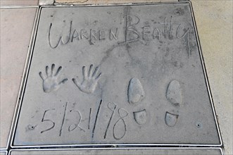 Handprints and footprints of WARREN BEATTY, Hollywood Boulevard, Los Angeles, California, USA,