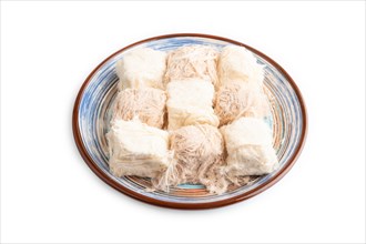 Traditional arabic sweets pishmanie isolated on white background. side view, close up