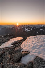 View of mountain panorama, sun star at sunset, summit of Skala, Loen, Norway, Europe