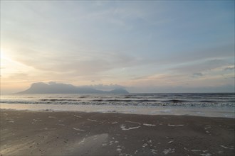 Bako national park, sea sandy beach, overcast, cloudy sunset, sky and sea, low tide. Vacation,
