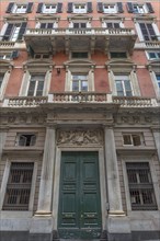 Palazzo Bendinelli Sauli, the coat of arms above the door are the symbols of the cities of Genoa