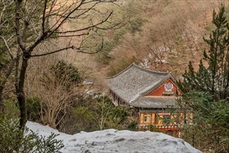Winter landscape of Guinsa temple building on mountainside in South Korea