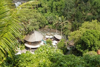 Tegenungan waterfall, Bali island, Ubud, Indonesia. Jungle, tropical forest, daytime with cloudy