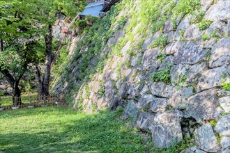 Stone wall located at foot of Hiroshima Castle in Japan