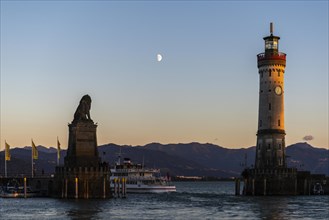 Lindau at Lake Constance, entrance to the harbour, Bavarian lion, new lighthouse, view of the Alps,