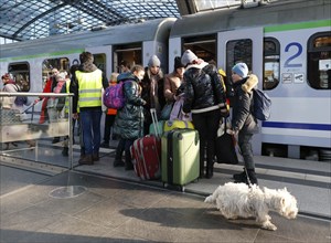 Refugees from Ukraine arrive at Berlin Central Station on a train from Poland, 10/03/2022