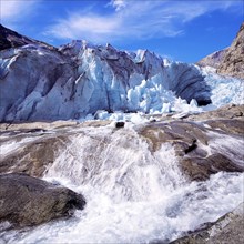 A vigourous melt-water stream issuing from the snout of the Nigardsbreen glacier, Jostedal National